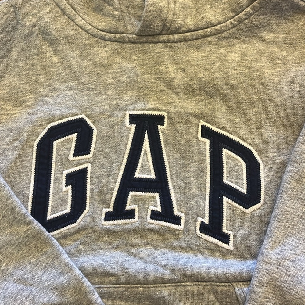 The gap kids, gray sweatshirt, hoodie, boys, or girls size small.